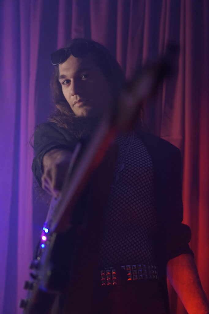 Andrew Brooks and his guitar, "Chaos"